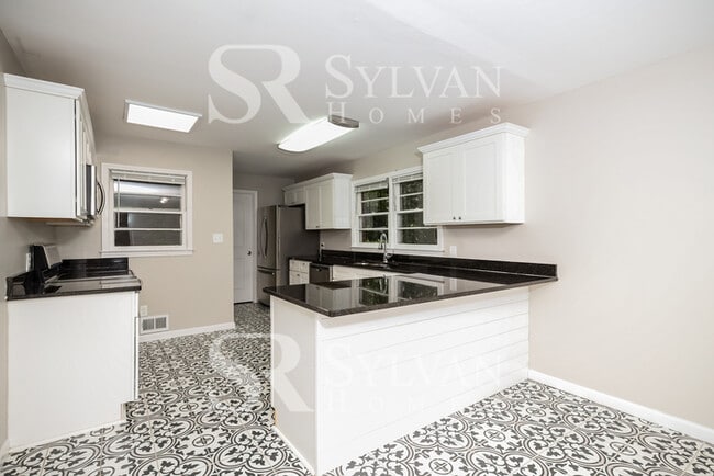 Building Photo - Turn the key. Enter. Smile. Repeat every day!