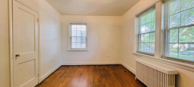 Building Photo - Remodeled brick bungalow with 1st floor li...