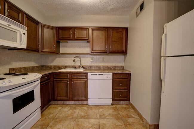 Building Photo - FIRST FULL MONTH FREE! Two Bedroom Condo n...