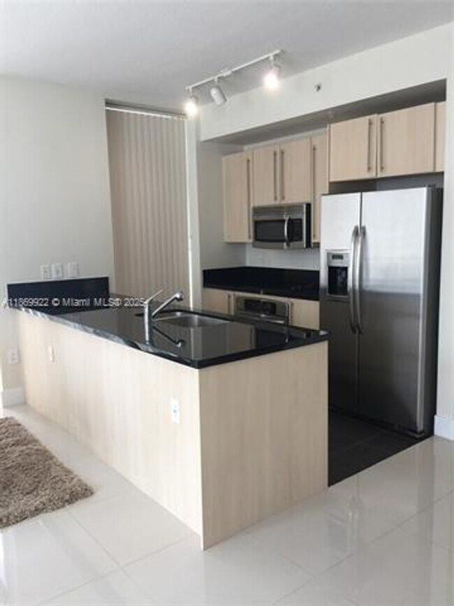Building Photo - 79 SW 12th St unit 1406-S (A11869922)