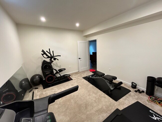 Building Photo - Stunning 5-Bedroom Custom Home with Solar, EV Charging & Private Media Room