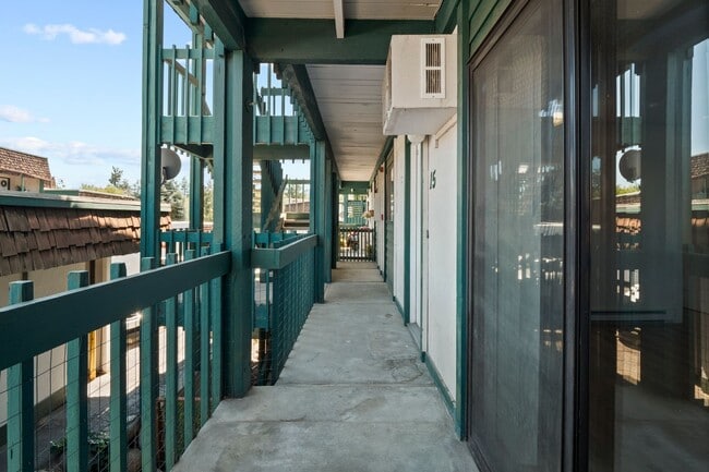 Building Photo - Spacious And Nicely Updated 2 bed 1 Bath Condo unit w/ full size laundry