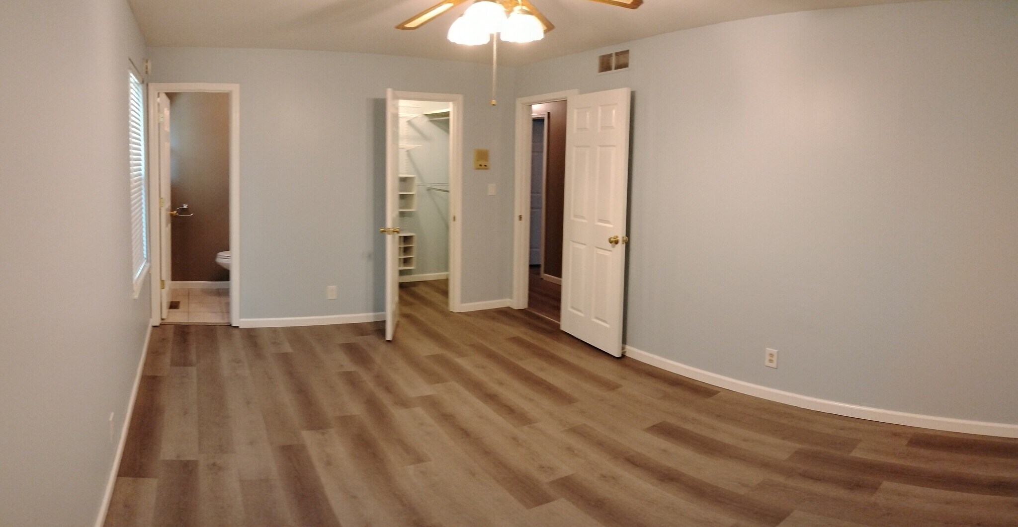 Master bedroom with walk-in closet & half bath - 529 Strawberry Hill Rd