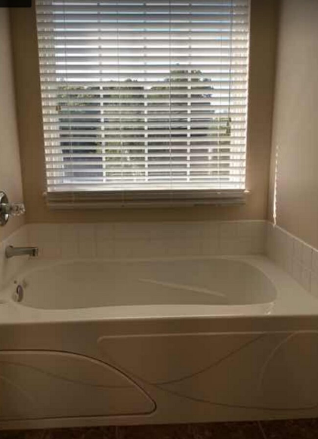 Building Photo - A MUST SEE HOME IN WOODGATE!
