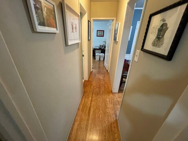 Hallway facing 2nd BR; bathroom on left, breakfast nook (currently used reception) on right - 1240 Greenacre Ave