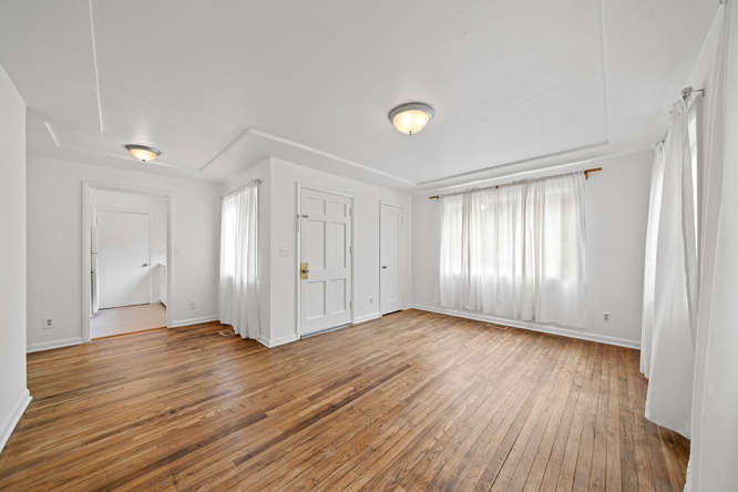 Living room + dining nook - 8808 N Peninsular Ave