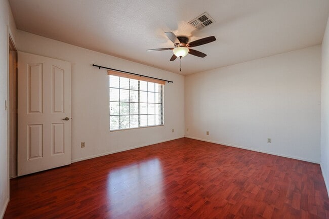 Building Photo - Welcome to this stunning 4-bedroom, 2-bath...