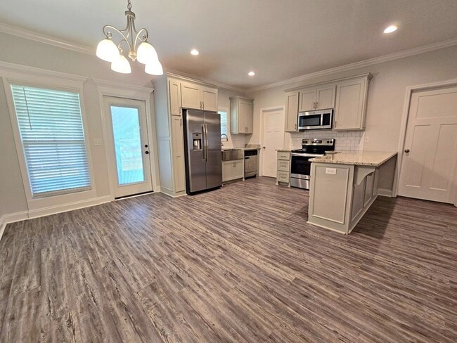 Building Photo - Stylish 4-Bedroom Home with Screened Porch...