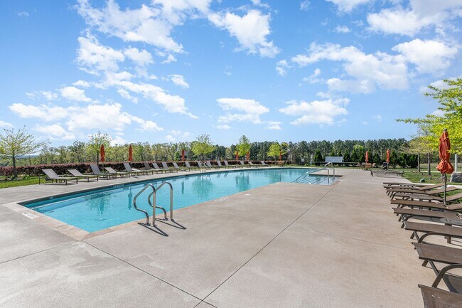 Building Photo - Gorgeous 5 Bedroom Home with First Floor In-law Suite & 3 Car Garage, Golf Course, Pool, Tennis a...