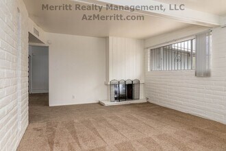 Building Photo - Large 4 Bedroom, 2 bath house with fireplace, a/c, fenced yard, carport, ready to move in