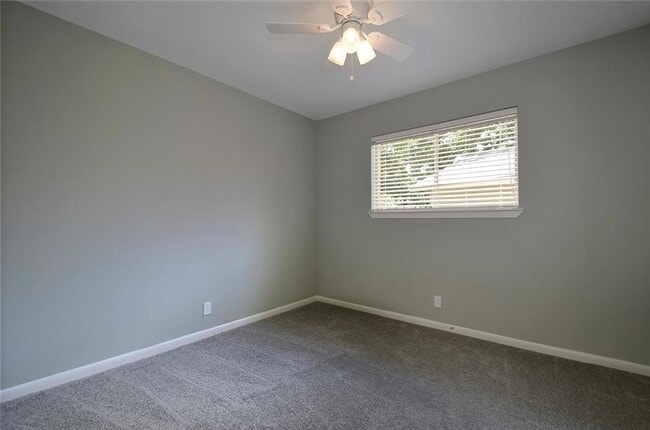 Building Photo - 10110 Woodland Village Dr
