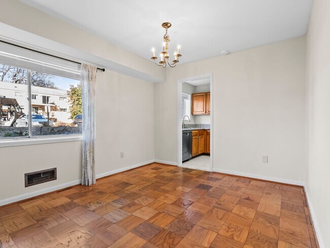 Building Photo - Commuter’s Dream! Large 2BR/2BA Condo Steps from Metro – All Utilities Included!