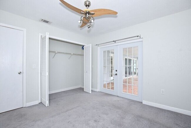 Building Photo - Gorgeous 4/2 Pool Home with a Covered Patio and a Large Fenced Backyard Located in Dr. Phillip's ...