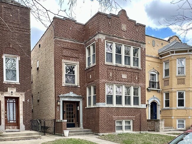 Building Photo - 5023 N Ridgeway Ave