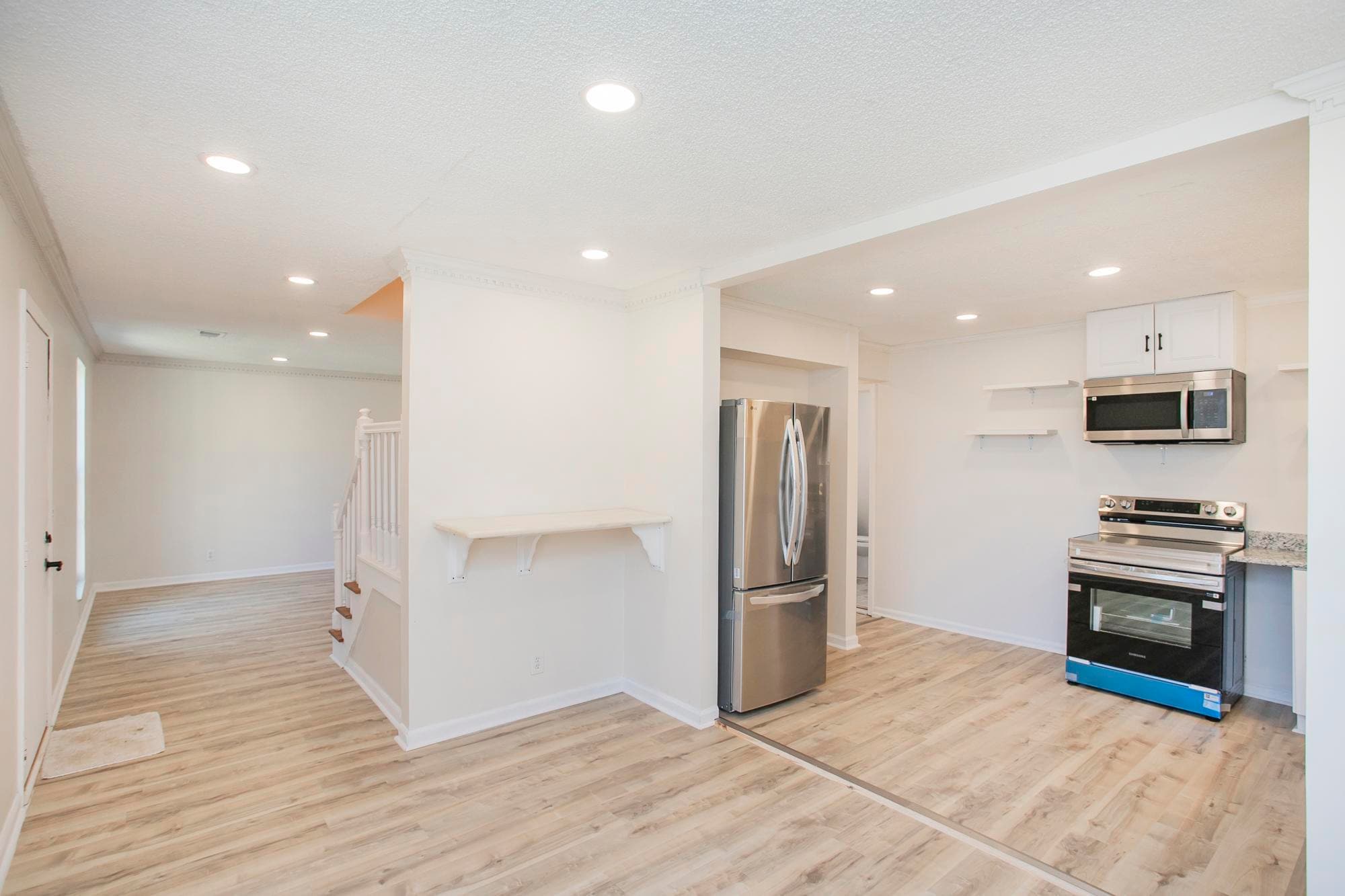 The open-concept layout allows the kitchen to flow seamlessly into the main living areas - 105 Jacksons Retreat Ct