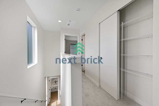 Building Photo - Brand-New 2026 Townhome | 3 Bed | 2.5 Bath | 1,560 Sq Ft | EV Garage | A/C Included