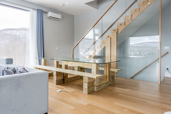 Building Photo - Modern Mountain Retreat with Rooftop Hot T...