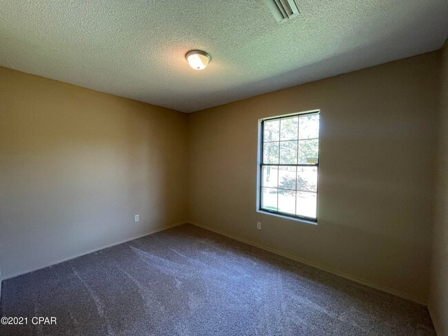 Building Photo - Spacious 3/1 Brick Home in a Low-Traffic c...