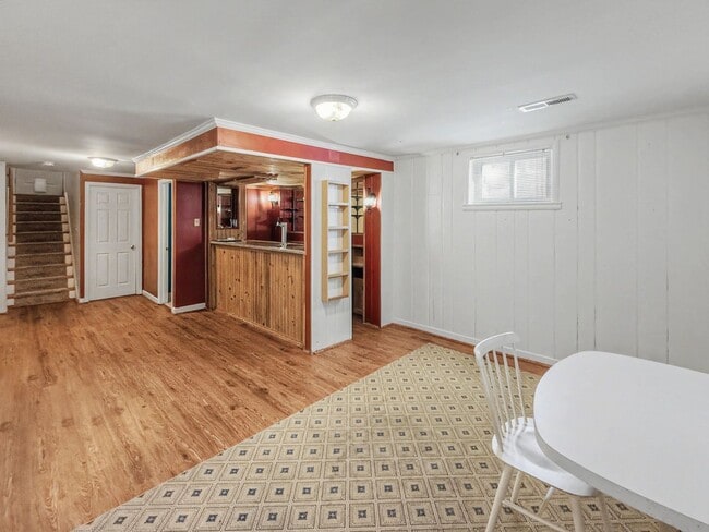 Building Photo - Furnished 4BD 2BA Home with Two kitchens, Basement, and Garage!