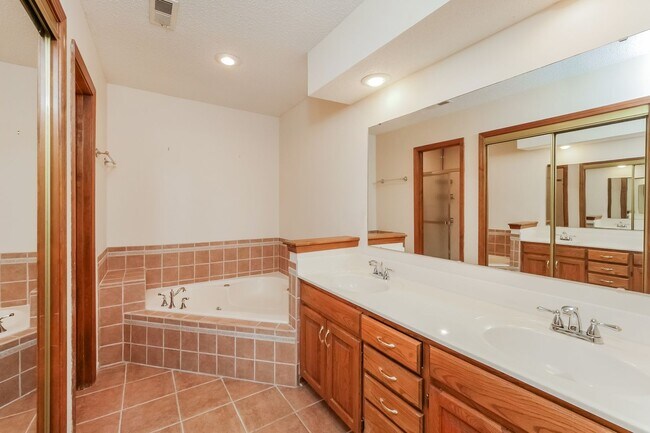 Building Photo - 4 Bedroom Shawnee Townhome with Finished Basement and Wooded Views