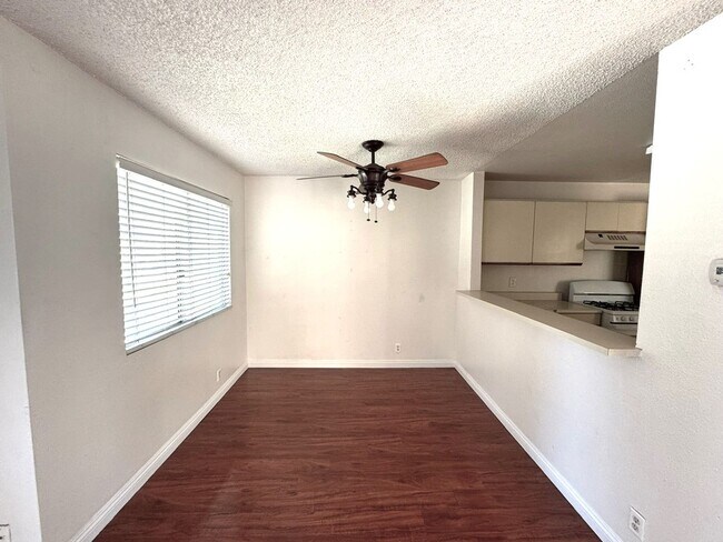Building Photo - 2 Bedroom, 2 Bath Upstairs Condo with Private Balcony & 2-Car Garage, Gated Community, Water/Tras...