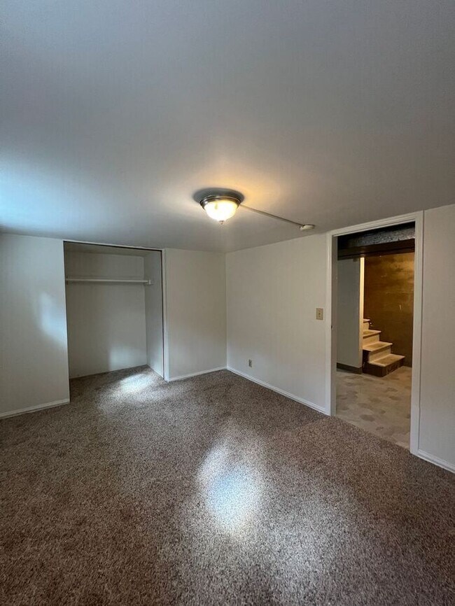 Building Photo - Your Mt. Tabor Oasis: Huge Yard, Oversized Shop-Garage & Sun-Drenched Living!