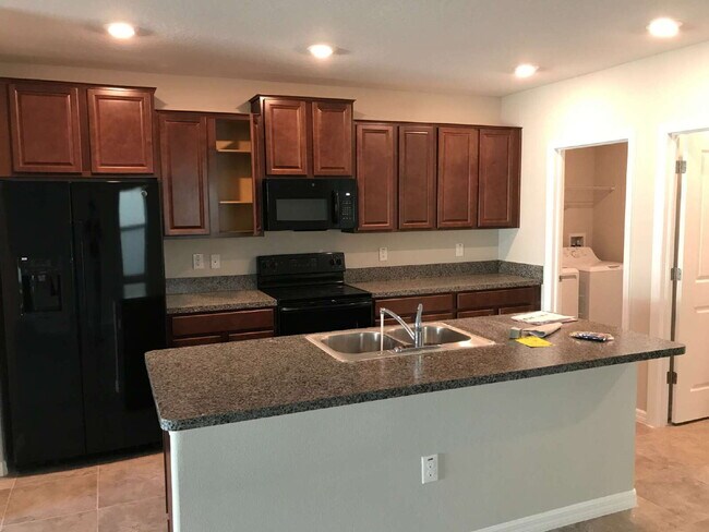 Building Photo - 7418 Rosy Periwinkle Ct