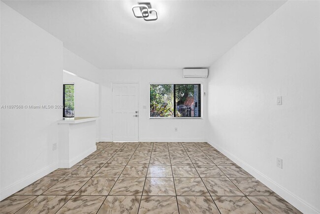 Building Photo - 6432 NE 1st Ct