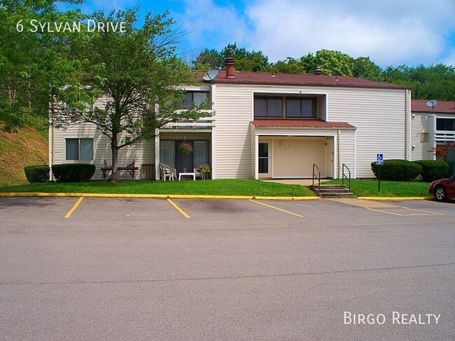 Building Photo - Warm up next to the fire in this 2 bedroom...