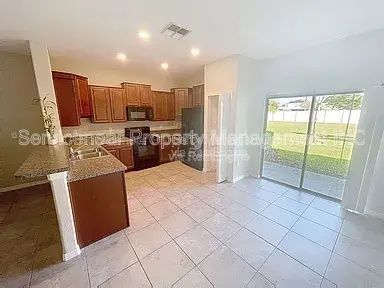 Building Photo - 7622 Ginger Lily Ct