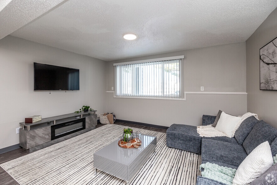 2BR, 1.5BA - 1,012SF - Living Room - Weston Park Apartments