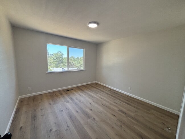 Building Photo - Fully remodeled home nestled on a spacious...