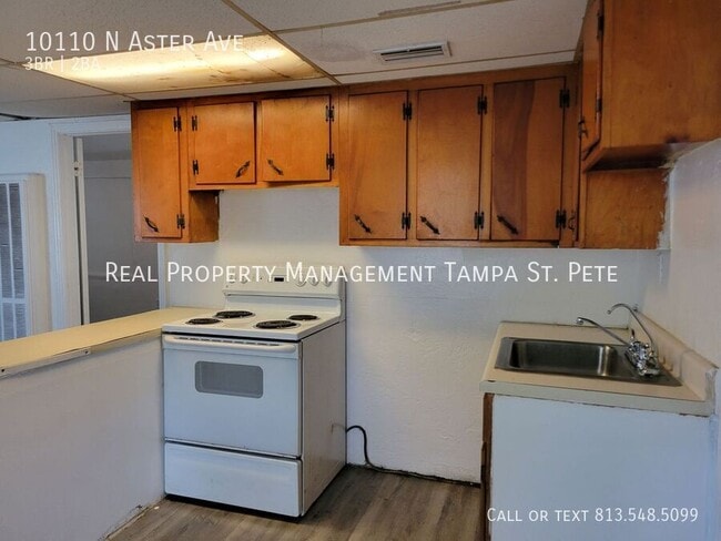 Building Photo - 10110 N Aster Ave