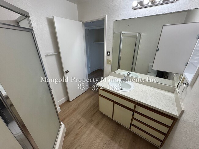 Building Photo - Spacious 2-Bed, 2-Bath Condo with Fireplac...