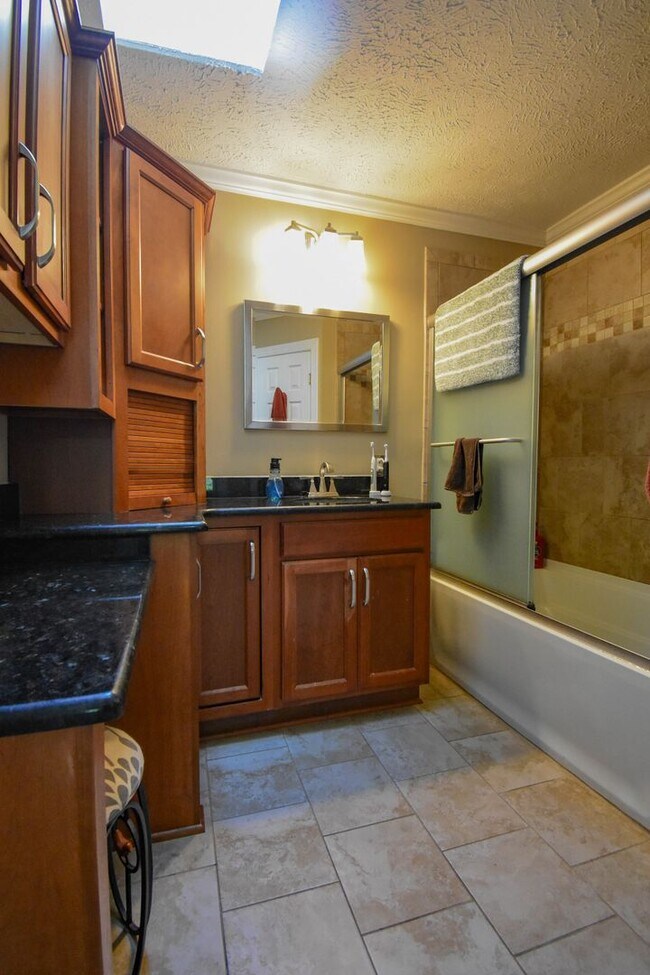 Building Photo - Coming Soon! 4 Bedroom 2.5 Bathroom With A Large Deck and 2 Car Garage! Near Methodist University