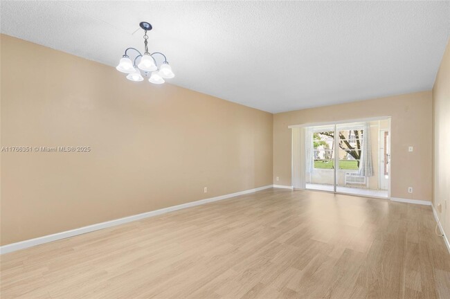 Building Photo - 606 SW Natura Blvd