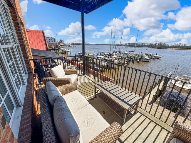Building Photo - Fully Furnished Waterfront Elegance on Mai...