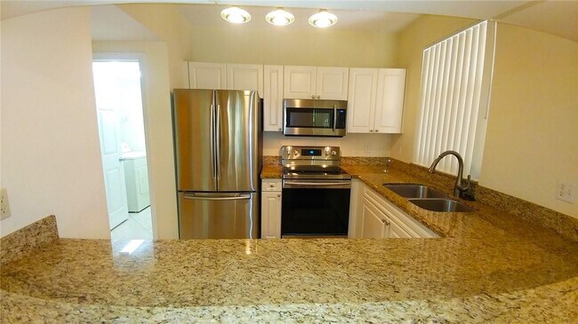 Building Photo - 6640 W Sample Rd