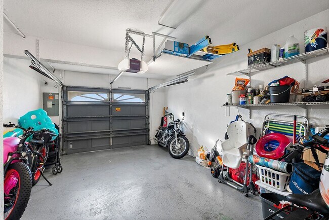 Building Photo - Two Bedroom/Two and a half bath gated townhome.