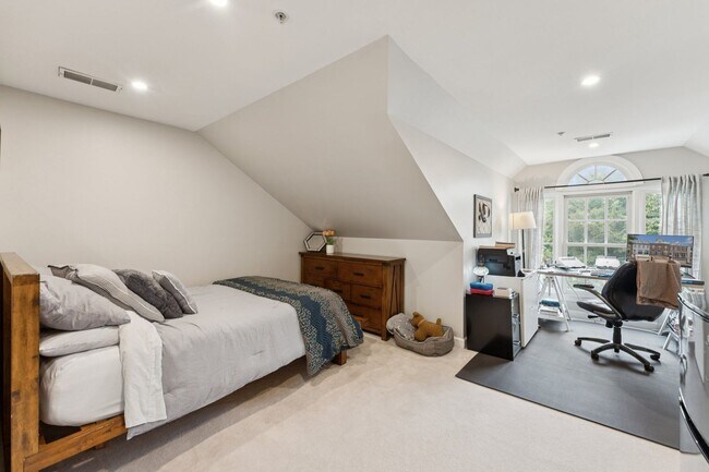 Building Photo - Discover this stunning four-level townhous...