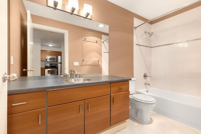 Building Photo - Modern Cap Hill 1 Bedroom with Garage Parking & Laundry Room