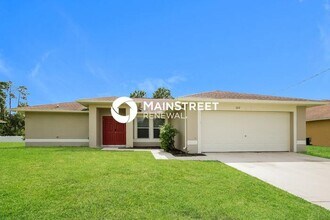 Building Photo - 3 Bedroom Pet-Friendly Home in Lehigh acres, FL with Main Street Renewal