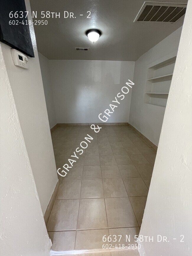 Building Photo - 6637 N 58th Dr