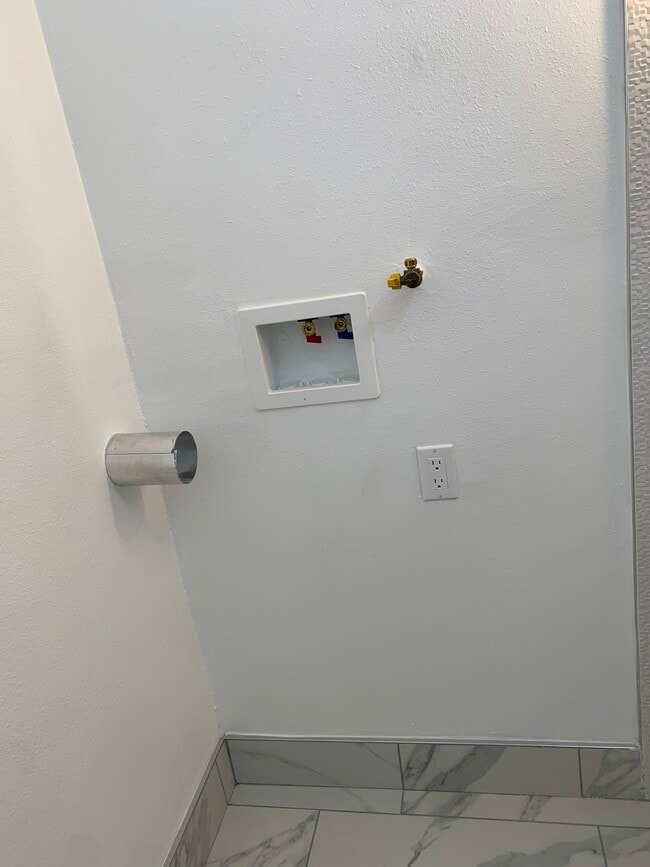 washer and dryer hook up in bathroom - 11138 Aqua Vista St