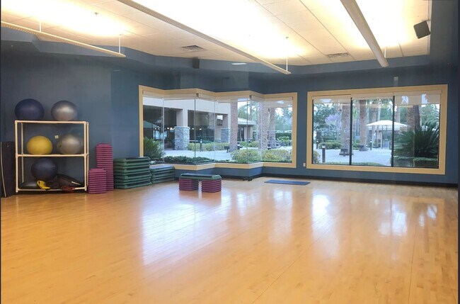 Building Photo - LUXURY LIVING • GOLF COURSE VIEW • GUARD-GATED COMMUNITY