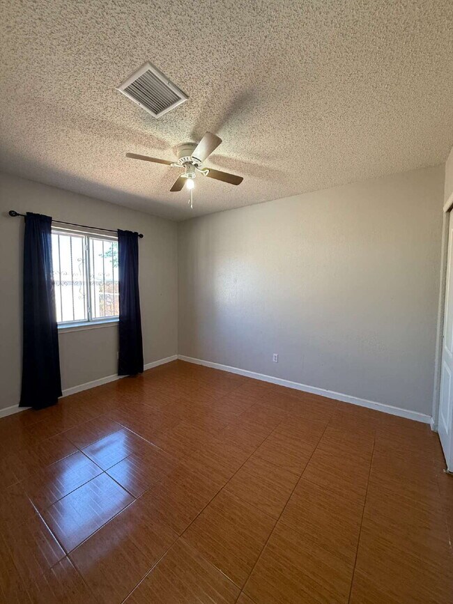 Building Photo - Well, kept three-bedroom, two baths home with Solar Panels. A must see, lease today! 11797 Imperi...