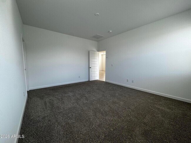 Building Photo - 5835 E Freesia Ln