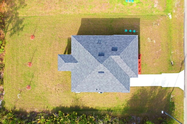 Building Photo - Brand New 4-Bedroom Gem with 2 Full Baths on Large Lot in Lehigh Acres – A Perfect Family Haven!