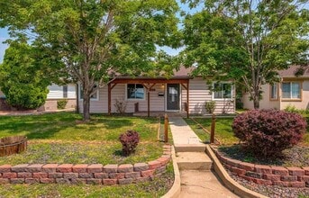 Building Photo - 4BD, 2BA Chaffee Park Home with Yard and 1-Car Garage