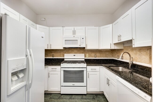 Building Photo - Ideally located near the Metro and Tysons Galleria, offering premier access to shopping, dining, ...